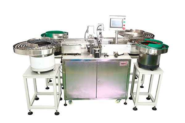 Máquina de montagem de tampas e tampas